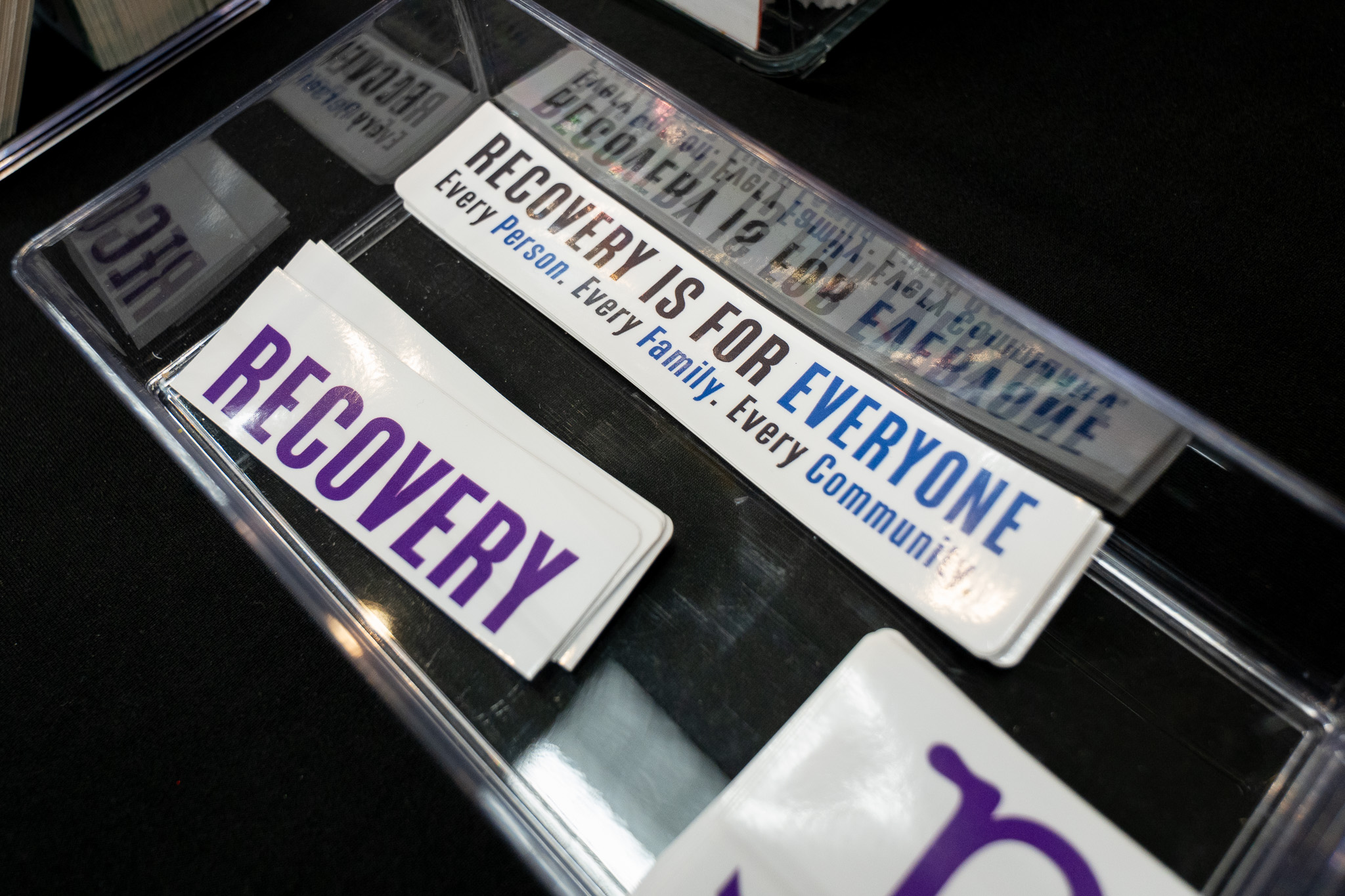 Stickers await new homes at Recovery Ho'olaule'a at Windward Community College Sept. 4, 2026. (Craig Fujii/Civil Beat/2026)