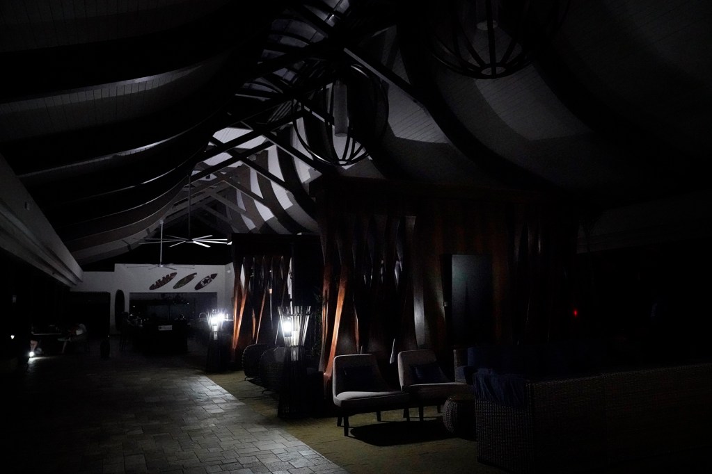 Hilton Garden Inn Kauaʻi Wailua Bay uses lanterns to light its lobby Tuesday, Sept. 8, 2026, in Poʻipū. The hotel has no power for like much of the Garden Isle after Hurricane Lowell passed nearby. (Kevin Fujii/Civil Beat/2026)