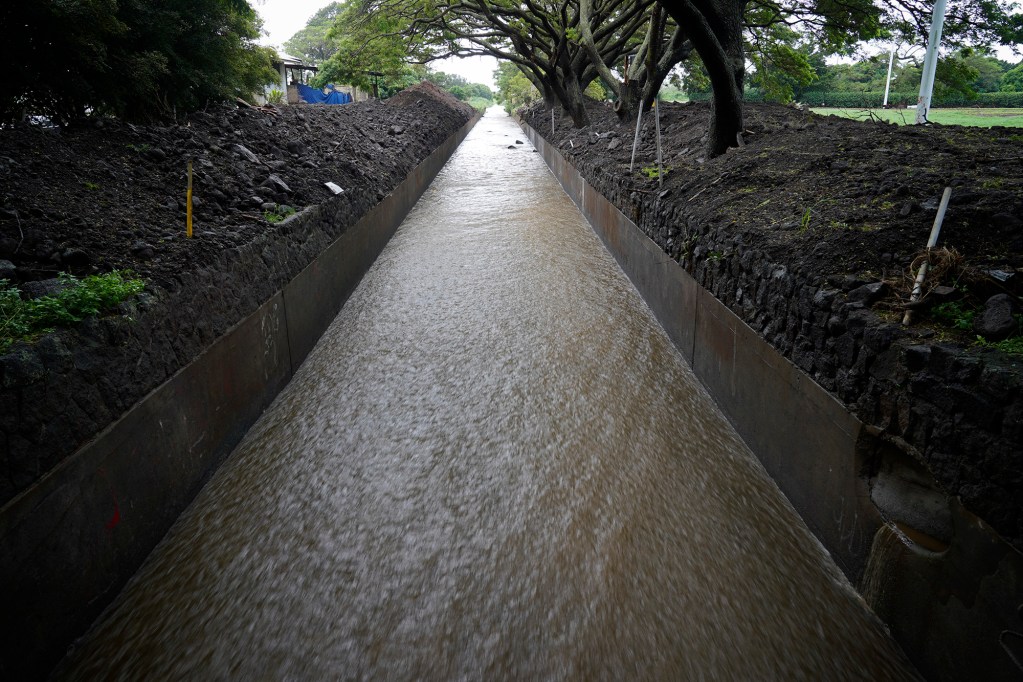 A drainage shows only a few boulders next to Nāʻālehu Community Park after Hurricane Nolo Saturday, Sept. 26, 2026, in Nāʻālehu. (Kevin Fujii/Civil Beat/2026)