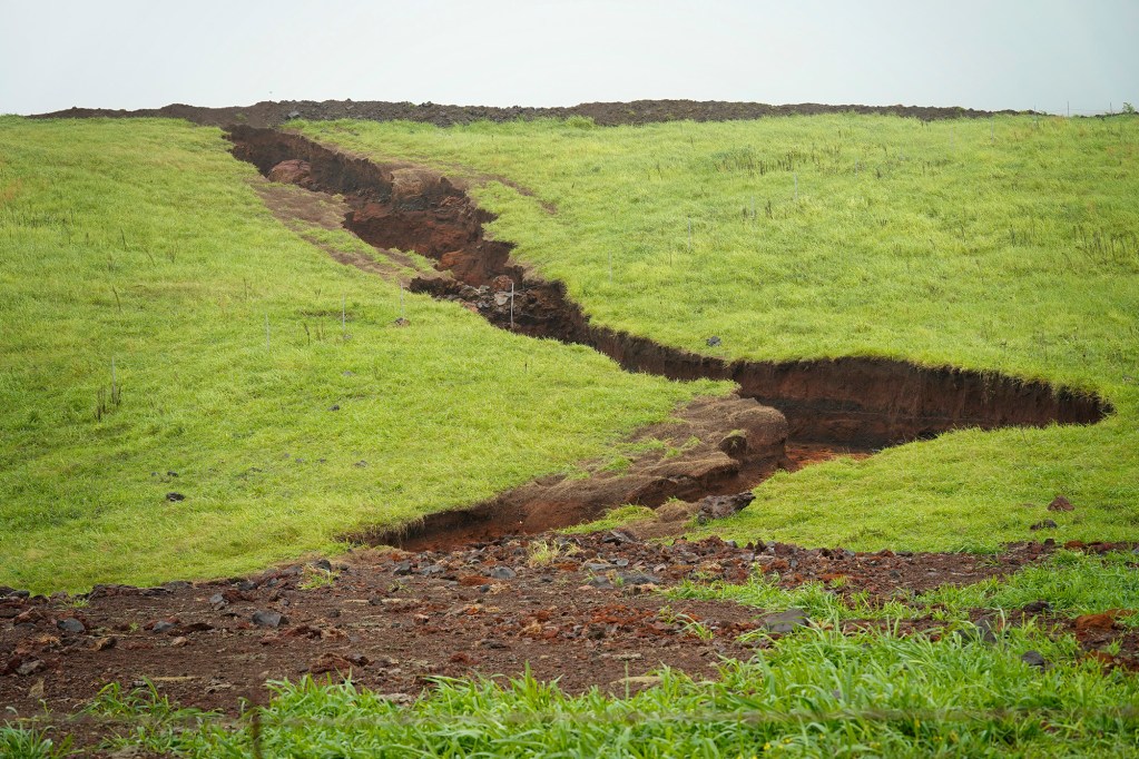 Water from Hurricane Lala and now Hurricane Nolo cut through Kuahiwi Ranch Saturday, Sept. 26, 2026, in Nāʻālehu. (Kevin Fujii/Civil Beat/2026)