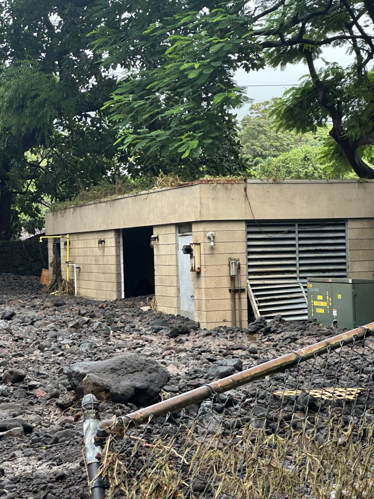Floodwater from Hurricane Lala on Aug. 15 caused mud and debris to plow into the well power building of the Punaluʻu Water and Sanitation well power building.