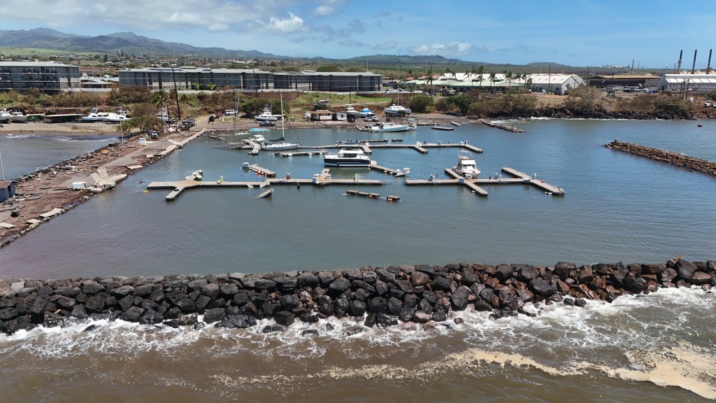 Port Allen on Kaua‘i in the days after Hurricane Lowell brought strong winds and rain, ripping through the facility's breakwater, floating docks and roads.