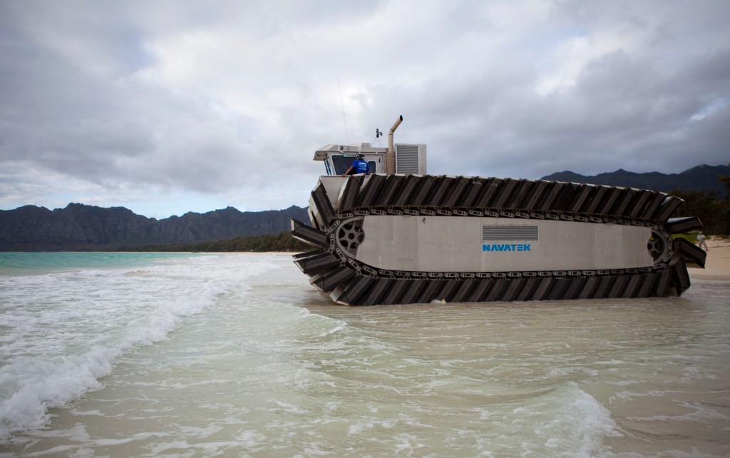 The Ultra Heavy-Lift Amphibious Connector (UHAC), a prototype amphibious vehicle, heads out to shore during a Marine Corps Warfighting Experiment. The Marine Corps Warfighting Lab (MCWL) is participating in Rim of the Pacific (RIMPAC) Exercise 2014 testing potential future technologies, solutions and concepts to future Marine Air Ground Task Force (MAGTF) challenges. Twenty-two nations, more than 40 ships and submarines, about 200 aircraft and 25,000 personnel are participating in RIMPAC from June 26 to Aug. 1 in and around the Hawaiian Islands and Southern California. The world's largest international maritime exercise, RIMPAC provides a unique training opportunity that helps participants foster and sustain the cooperative relationships that are critical to ensuring the safety of sea lanes and security on the world's oceans. RIMPAC 2014 is the 24th exercise in the series that began in 1971. (U.S. Marine Corps photo by Lance Cpl. Aaron S. Patterson, MCBH Combat Camera/Released)