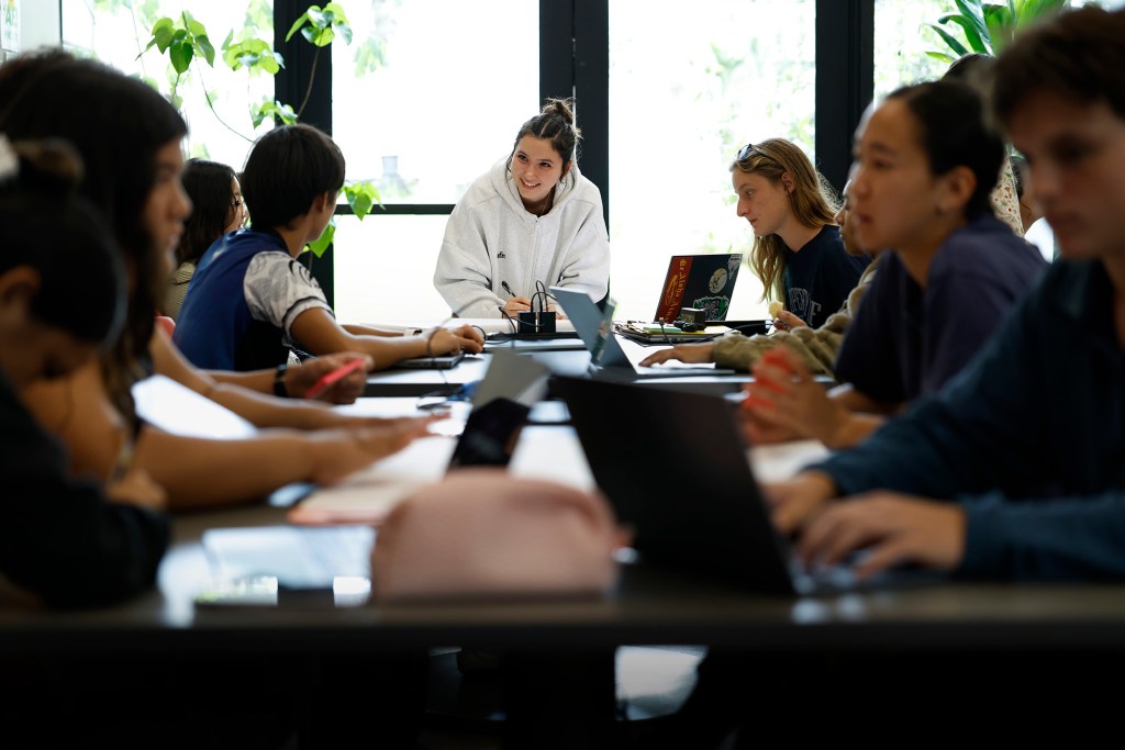Nalukai team leader Rosabella Magoon works with her group of Hawaiʻi Island teens Thursday, Oct. 8, 2026, in Hilo. They spend the week learning how to identify and solve problems in their communities. Magoon previously participated in Nalukai. (Kevin Fujii/Civil Beat/2026)