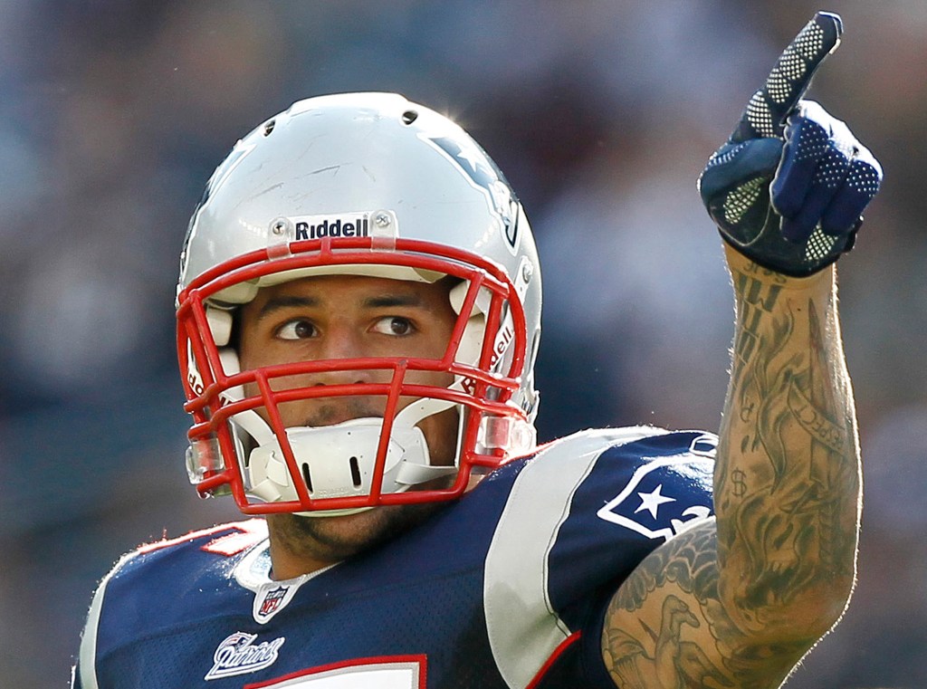 FILE - In this Oct. 17, 2010, file photo, New England Patriots tight end Aaron Hernandez reacts during the second half of an NFL football game against the Baltimore Ravens in Foxborough, Mass. Dr. Ann McKee of the CTE Center at Boston University presented the findings of her examination of Hernandez's brain on Thursday, Nov. 9, 2017. McKee says she could not say that Hernandez's behavior was a result of his severe case of chronic traumatic encephalopathy. But she says Hernandez suffered substantial damage to several important parts of the brain, including the frontal lobe. Hernandez killed himself in April, while serving life in prison for murder. (AP Photo/Winslow Townson, File)