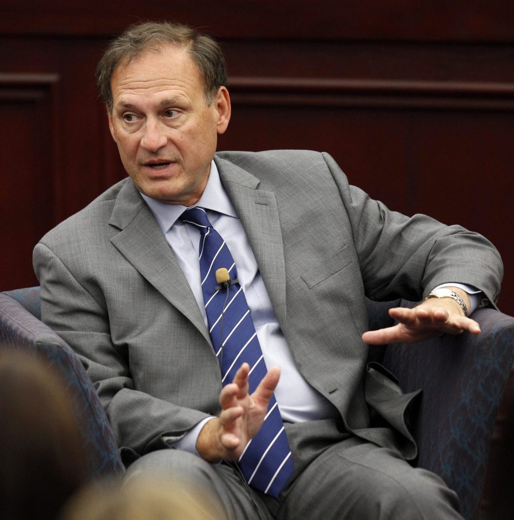 FILE - In this Sept. 14, 2012 file photo, Supreme Court Associate Justice Samuel Alito speaks at Roger Williams University Law School in Bristol, R.I. Alito is defending the court's 2010 decision in the Citizens United case that helped fuel hundreds of millions of dollars of spending by independent groups in the just-concluded campaign season. (AP Photo/Stephan Savoia, File)