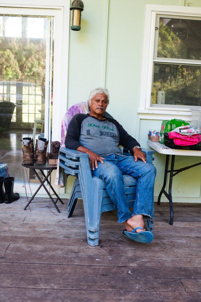 Hā‘ena, Hi - September 21, 2026: 
Portrait of 76 year old Michael Olanolan, a father of nine and grandfather of 26, has cleared the area’s main road of debris from Hā‘ena Beach Park to Wainiha so that electric crews could more easily access broken lines and poles. Other community members have cleared areas further east.
He learned to care for his community through his family values as a native Hawaiian / Filipino raised in Hā‘ena . 
Akasha Rabut for The Guardian