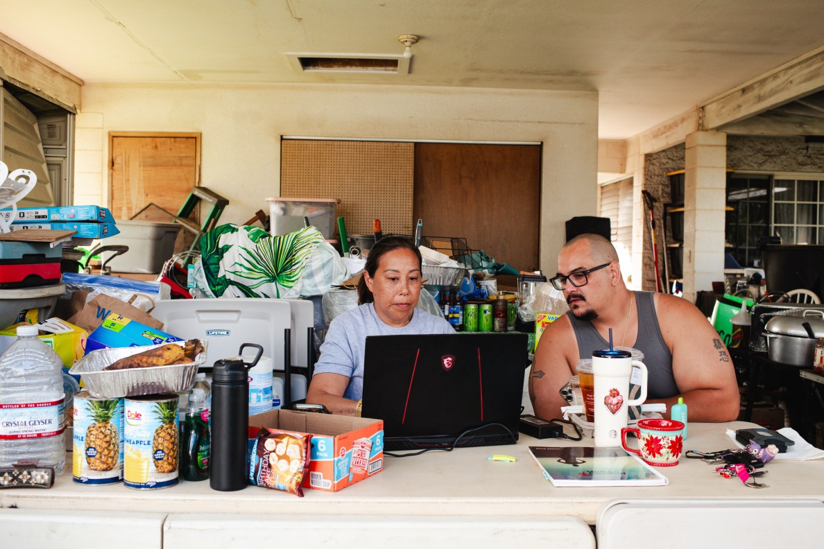Kīlauea, Hi - September 24, 2026: In Kīlauea, Raina Bautista and her husband Thomas Bautista turned their home into a community hub. Her 15 year old niece Kale Sambrano and their family cooked chili and rice, adobo, spaghetti, chowder, pasta and other meals for their community despite not having power or water themselves in the days after the storm. They used an outdoor camping stove and, once their stored water ran out, got water from a water buffalo sent by the county. Akasha Rabut for The Guardian
