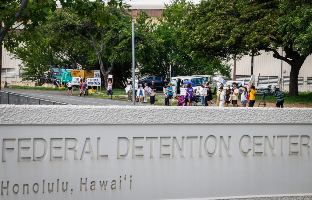 Activists and faith leaders from various factions joined in protest against ICE and immigration enforcement, Saturday, Oct. 10, 2026, outside the Federal Detention Center in Honolulu.  (Jamm Aquino/Civil Beat/2026)