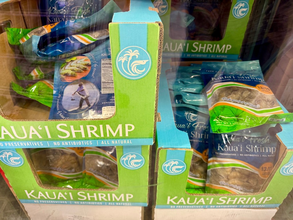 Boxes filled with bags of Kaua‘i Shrimp at Costco on O‘ahu.