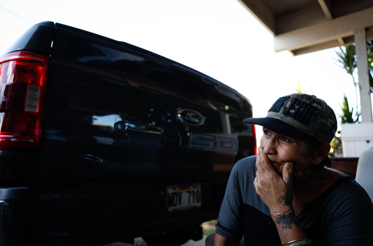 Kapu Shoaf sits in her garage, Monday, Oct. 12, 2026, in Honolulu. (Jamm Aquino/Civil Beat/2026)