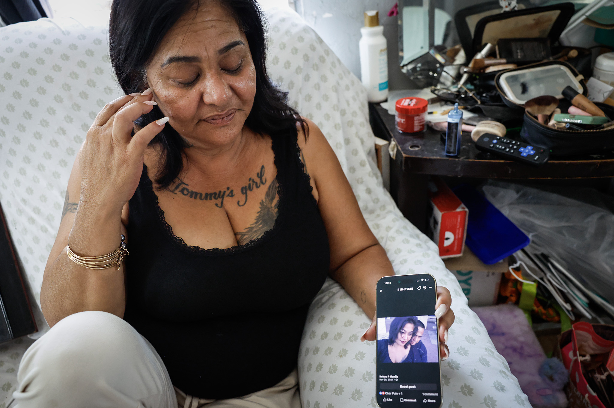 Kēhau Manijo shows a photo of herself and Tommy Manijo at her residence, Friday, Oct. 2, 2026, in Waiʻanae. (Jamm Aquino/Civil Beat/2026)